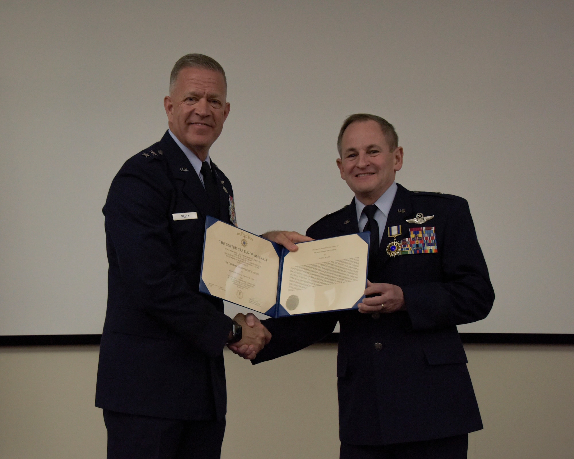 Photo of Brig Gen James Silvasy receiving award.