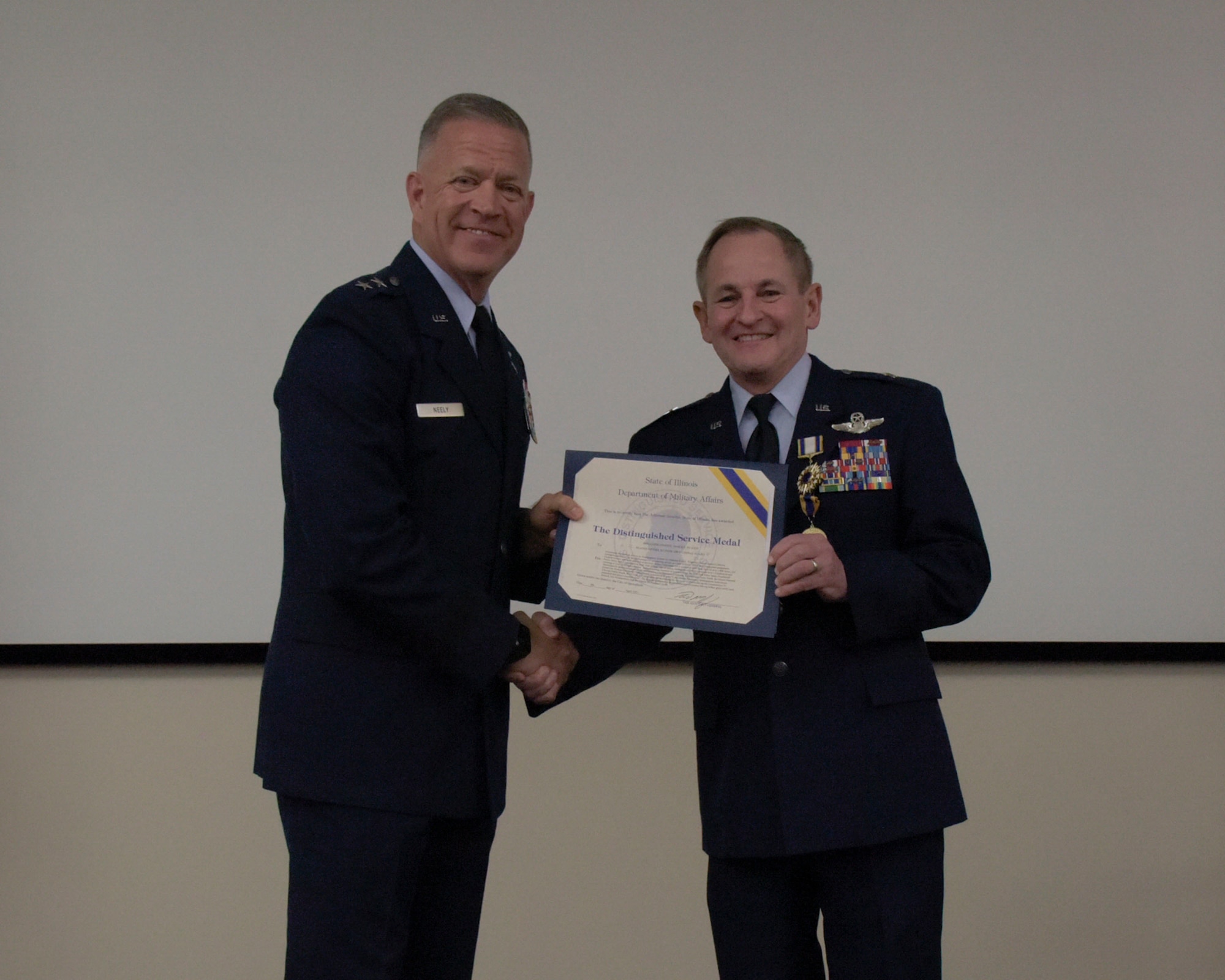 Photo of Brig Gen James Silvasy receiving award.