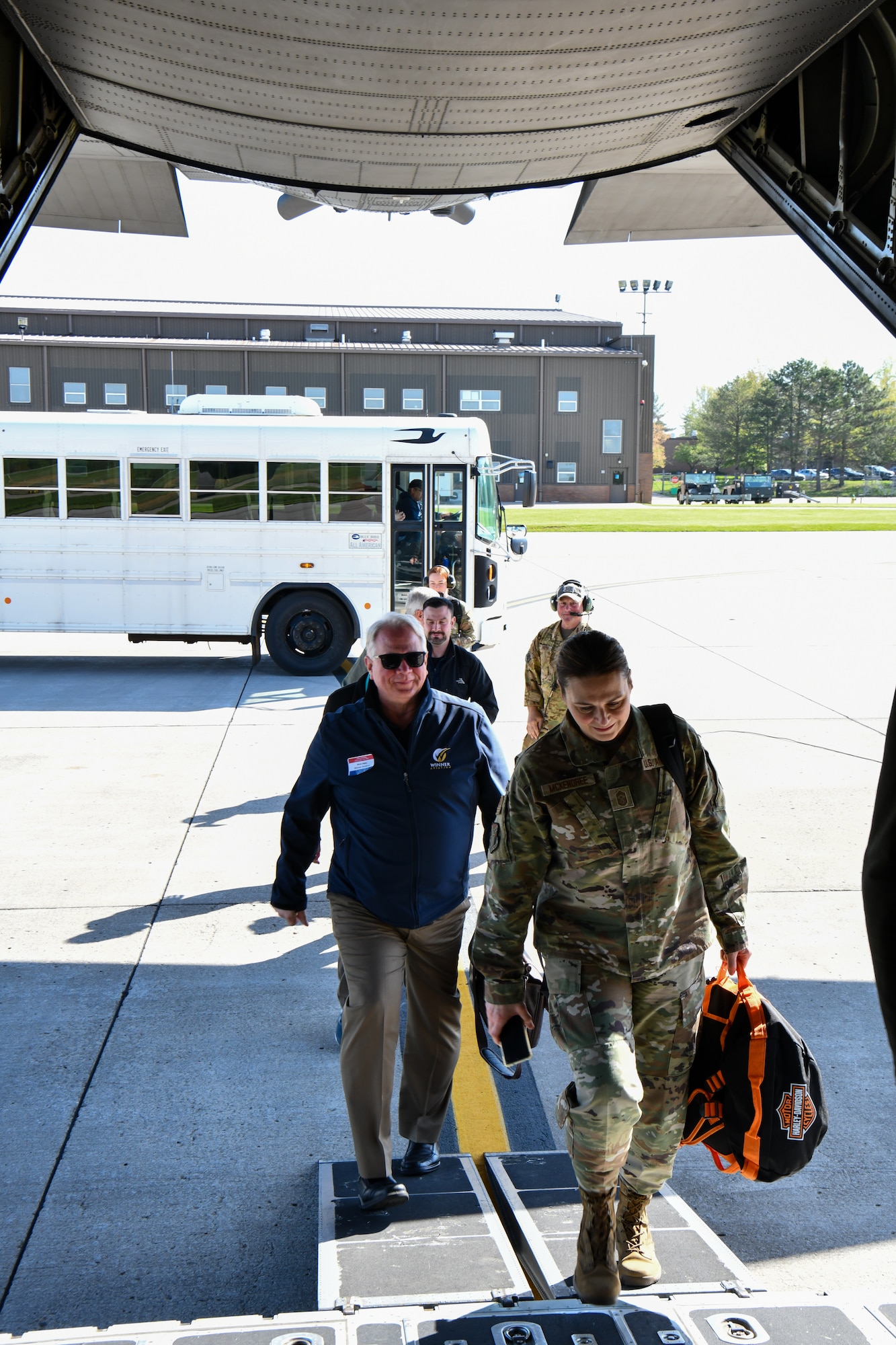 Participants in the 910th Airlift Wing’s civic leader tour to Dobbins Air Reserve Base, Georgia, board a C-130H Hercules aircraft at Youngstown Air Reserve Station, Ohio, May 11, 2023.