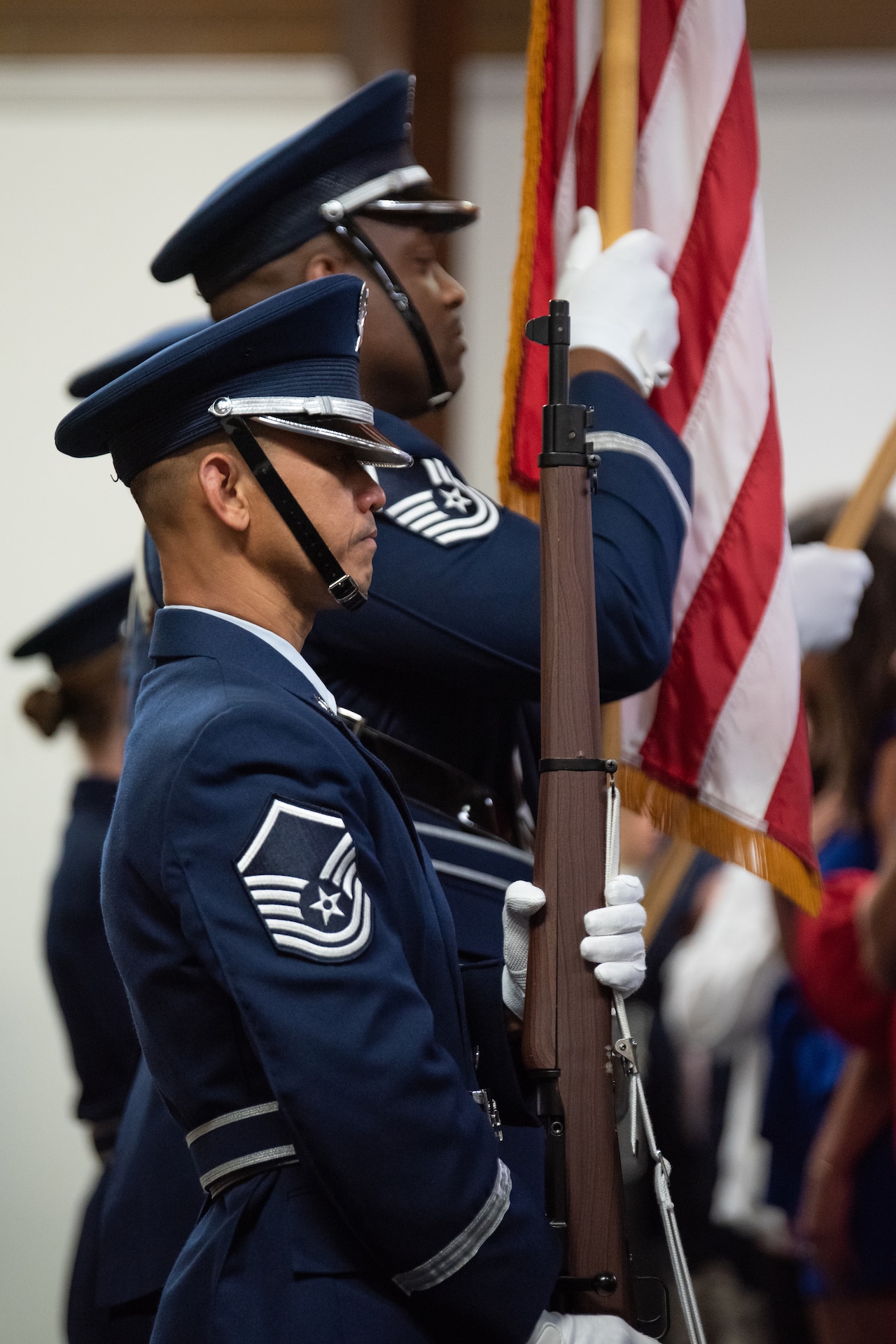 Honor Guard members from the 123rd Airlift Wing present the colors during a retirement ceremony for Chief Master Sgt. Kenneth Richards at the Kentucky Air National Guard Base in Louisville, Ky., May 20, 2023. Richards, senior enlisted leader of the 123rd Medical Group, is retiring after 30 years of service. (U.S. Air National Guard photo by Staff Sgt. Chloe Ochs)