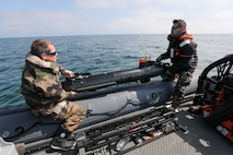 PUTLOS, Germany (June 5, 2023) French Navy Médecin en chef Adrien, left, and Premier Maître Sébastien, deploy an underwater vehicle (UUV) during a mine countermeasure evolution as part of exercise Baltic Operations 2023 (BALTOPS 23). BALTOPS 23 is the premier maritime-focused exercise in the Baltic Region. The exercise, led by U.S. Naval Forces Europe-Africa, and executed by Naval Striking and Support Forces NATO, provides a unique training opportunity to strengthen combined response capabilities critical to preserving freedom of navigation and security in the Baltic Sea. (U.S Navy photo by Chief Mass Communication Specialist Arif Patani)