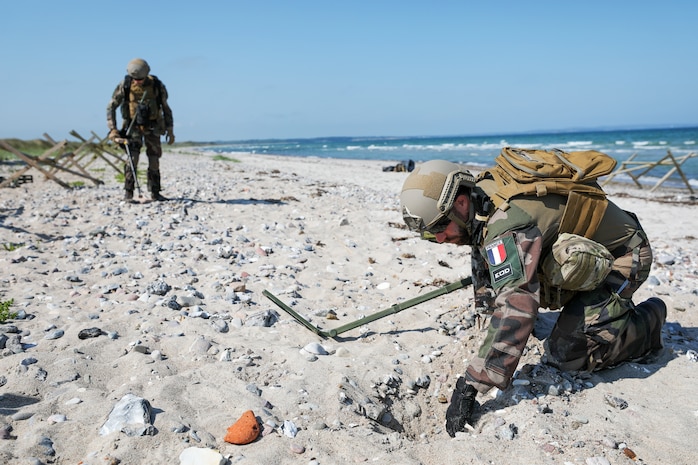 PUTLOS, Germany (June 6, 2023) French Navy Explosive Ordnance Disposal (EOD) technicians participate in land mine clearing scenarios as part of as part of exercise Baltic Operations 2023 (BALTOPS 23). BALTOPS 23 is the premier maritime-focused exercise in the Baltic Region. The exercise, led by U.S. Naval Forces Europe-Africa, and executed by Naval Striking and Support Forces NATO, provides a unique training opportunity to strengthen combined response capabilities critical to preserving freedom of navigation and security in the Baltic Sea. (U.S Navy photo by Chief Mass Communication Specialist Arif Patani)