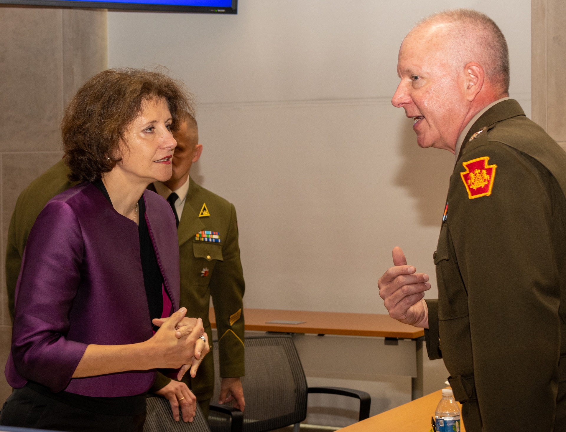 Audra Plepytė, left, Lithuanian ambassador to the United States and Mexico, talks with Pennsylvania Adjutant General Maj. Gen. Mark Schindler during a ceremony celebrating the 30th anniversary of the partnership between the Pennsylvania National Guard and Lithuania June 6 in Harrisburg, Pa. (Pennsylvania National Guard photo by Wayne V. Hall)