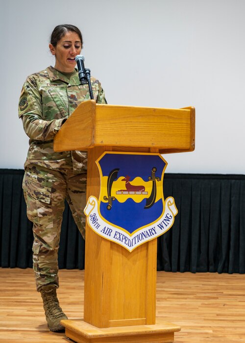 Maj. Katie Evans, 386th Expeditionary Force Support Squadron commander, addresses her new squadron during a change of command ceremony at Ali Al Salem Air Base, Kuwait, June 7, 2023.