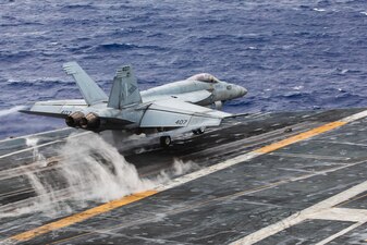 An F/A-18E Super Hornet from VFA-146 launches from USS Nimitz (CVN 68).