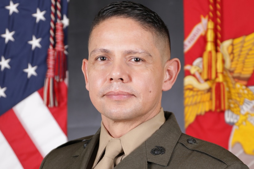 A Marine poses for a photo.