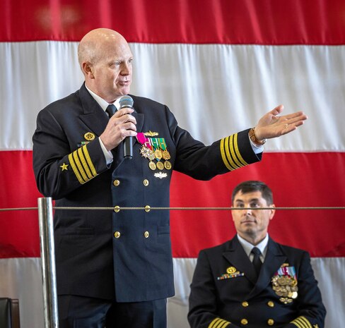 Capt. Jip Mosman, outgoing commander, Puget Sound Naval Shipyard & Intermediate Maintenance Facility, bids farewell to shipyard employees before relinquishing command to Capt. JD Crinklaw, right, May 25, 2023, during a change-of-command ceremony at the shipyard in Bremerton, Washington. (U.S. Navy photo by Scott Hansen)