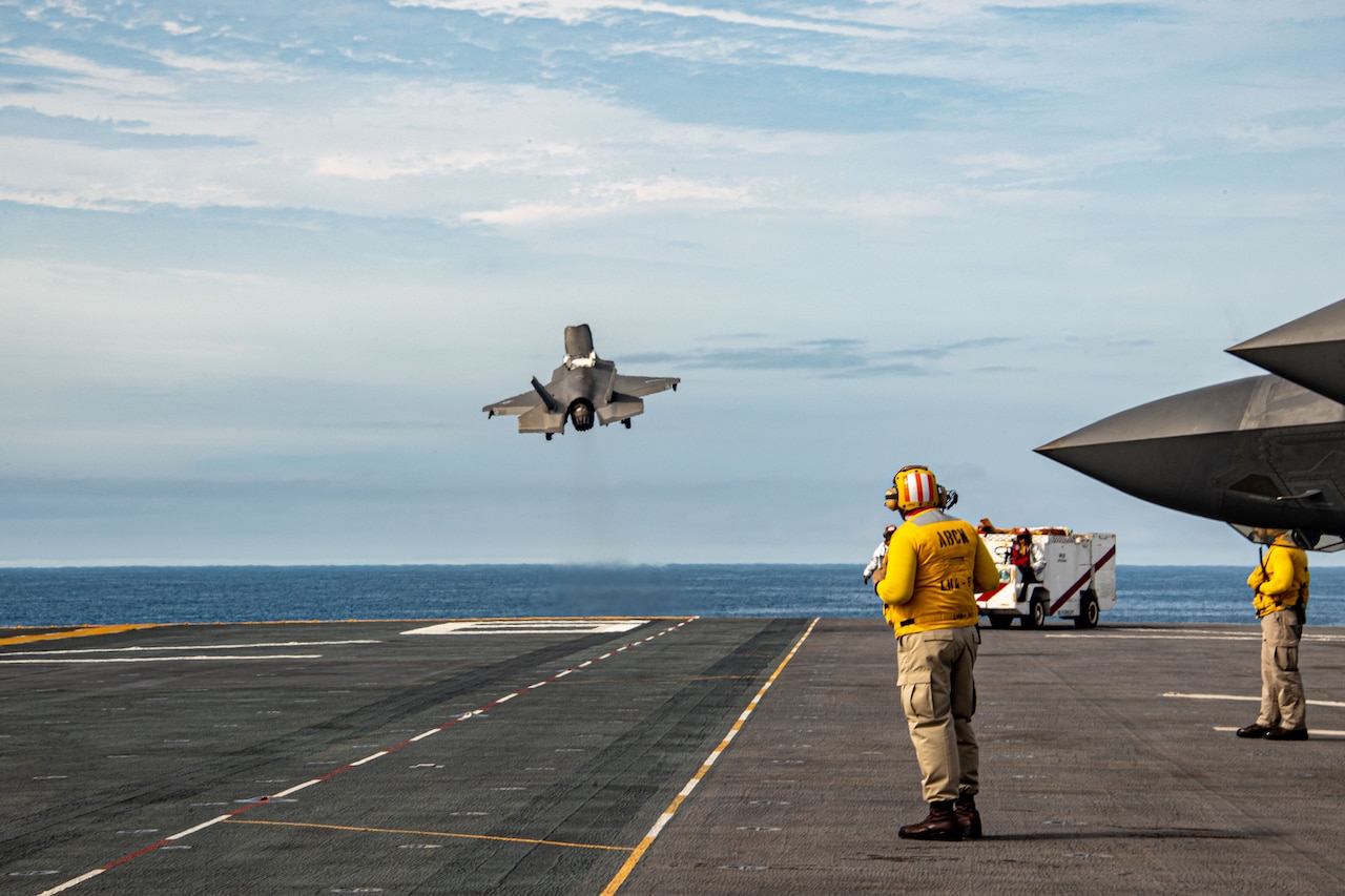 A jet takes off from a ship.