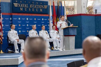 Chief of Naval Personnel Vice Adm. Rick Cheeseman gives opening remarks during Naval Education and Training Command’s (NETC) change of command ceremony at the National Naval Aviation Museum onboard Naval Air Station Pensacola, Florida, June 8, 2023. Rear Adm. Jeffrey Czerewko relieved Rear Adm. Pete Garvin and became the 21st commander of NETC. NETC's mission is to recruit, train and deliver those who serve our nation, taking them from street-to-fleet by forging civilians into highly skilled, operational and combat ready warfighters. (United States Navy photo by Mass Communication Specialist 1st Class Zachary Melvin)