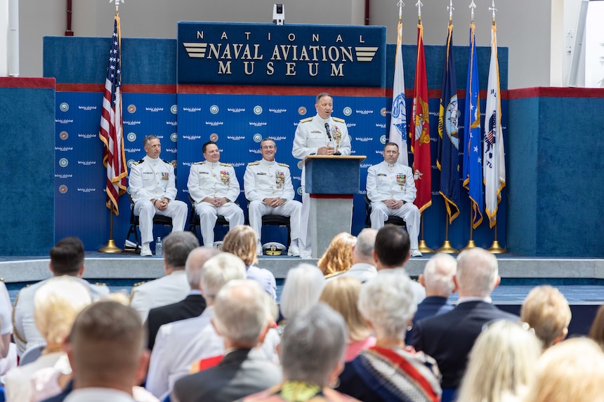 Rear Adm. Jeffrey Czerewko, commander, Naval Education and Training Command (NETC), gives remarks during NETC’s change of command ceremony at the National Naval Aviation Museum onboard Naval Air Station Pensacola, Florida, June 8, 2023. Czerewko relieved Rear Adm. Pete Garvin and became the 21st commander of NETC. NETC's mission is to recruit, train and deliver those who serve our nation, taking them from street-to-fleet by forging civilians into highly skilled, operational and combat ready warfighters. (United States Navy photo by Mass Communication Specialist 1st Class Zachary Melvin)