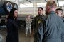 The Honorable Kristyn Jones, assistant secretary of the Air Force for Financial Management and Comptroller, performing the duties of under secretary of the Air Force, speaks to B-52H Stratofortress aircrew members, Maj. Zachary Proud, 20th Bomb Squadron instructor pilot, Capt. Kyle Barber, 20th Bomb Squadron weapons systems officer, and 1st Lt. Timothy Blue, 20th Bomb Squadron electronic warfare officer, during a base visit at Barksdale Air Force Baes, La., June 6, 2023.