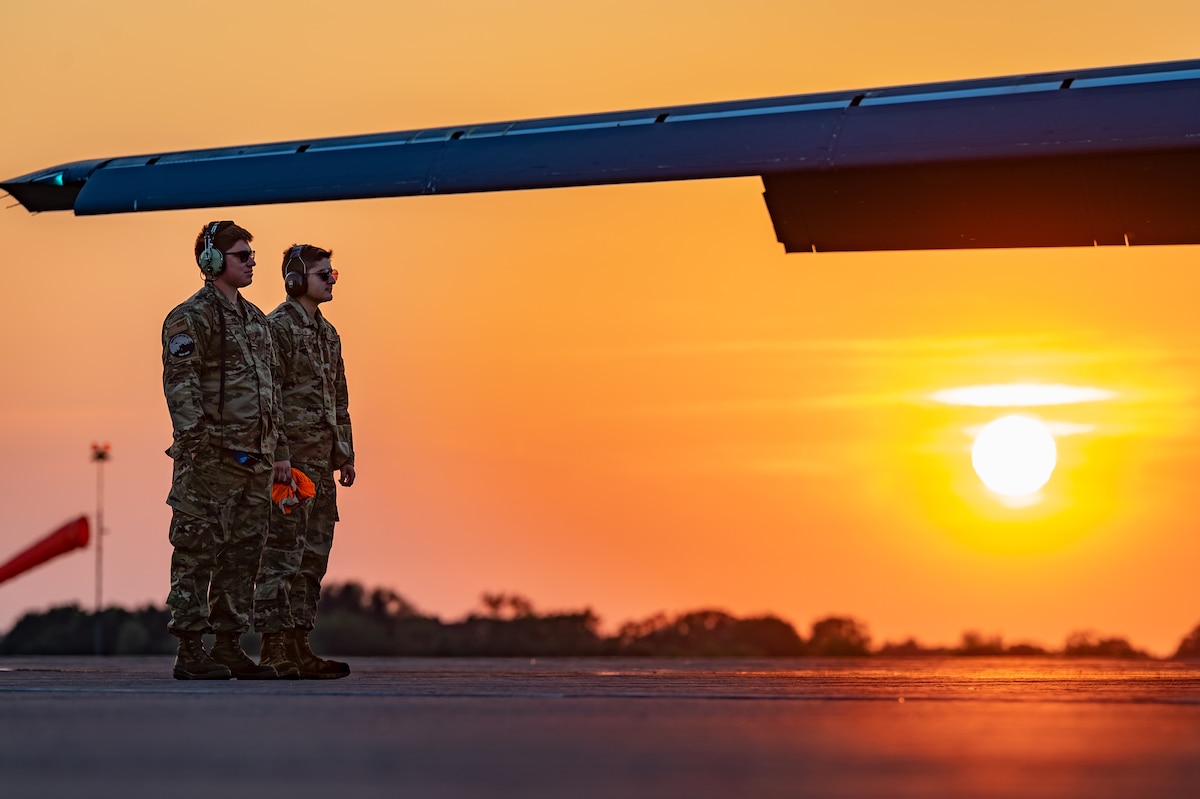 Staff Sgt. Sean Merrick, 9th Expeditionary Bomb Squadron B-1B Lancer crew chief, left, and Airman First Class Jackie Breeden, 9th EBS B-1B Lancer egress apprentice, prepare the B-1 for launch at Royal Air Force Fairford, United Kingdom, June 7, 2023.