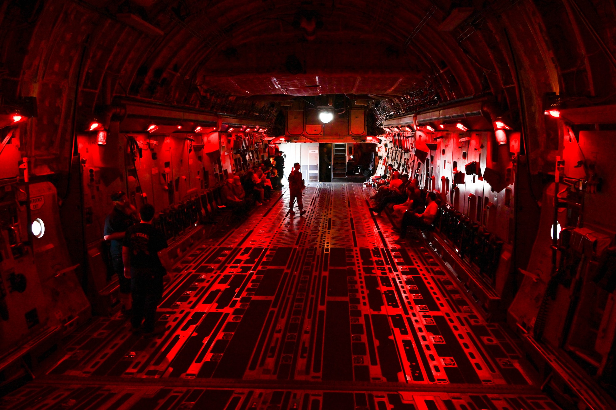 Altus Air Force Base (AFB), Oklahoma, civic leaders wait in the cargo loading area of a C-17 Globemaster III on the flight line at Altus AFB, Oklahoma, June 6, 2023. Both Altus and Vance AFB civic leaders had the opportunity to witness some of the C-17’s capabilities including air refueling. (U.S. Air Force photo by Senior Airman Trenton Jancze)