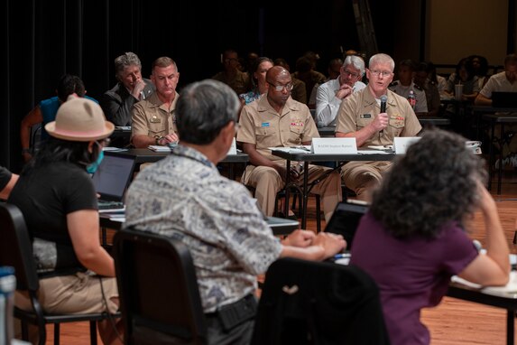 Joint Task Force-Red Hill (JTF-RH) Commander, U.S. Navy Vice Adm. John Wade, answers a question from a Fuel Tank Advisory Committee (FTAC) member during a FTAC meeting held at Moanalua High School Performing Arts Center in Honolulu, Hawaii, June 6, 2023.