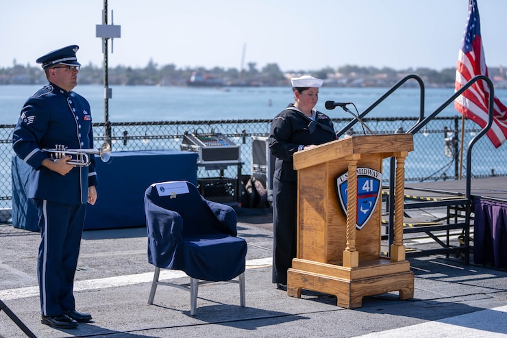 Bugler from the USAF Band of the Golden West provided Taps support for a memorial service aboard the USS Midway