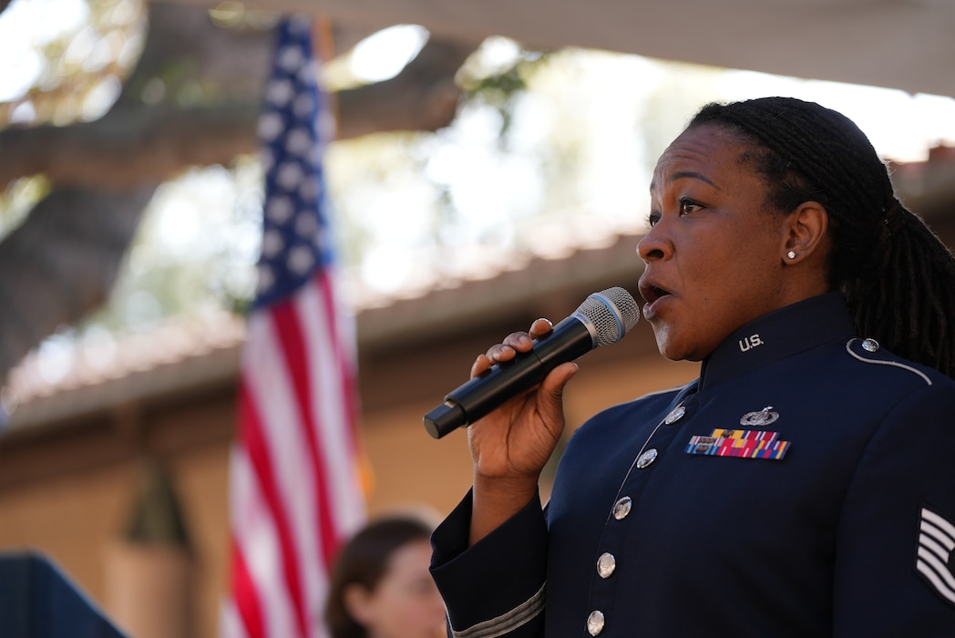 TSgt Sarah Howard-Carter sings with the Band of the Golden West at their President's Day concert at the Ronald Reagan Presidential Library