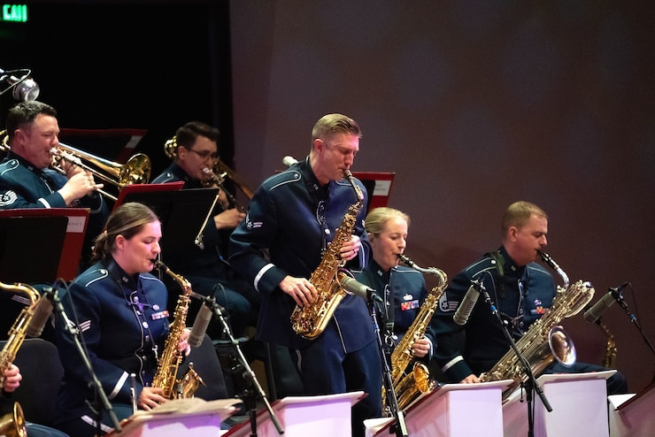 TSgt Sarah Howard-Carter sings with the Band of the Golden West at their President's Day concert at the Ronald Reagan Presidential Library