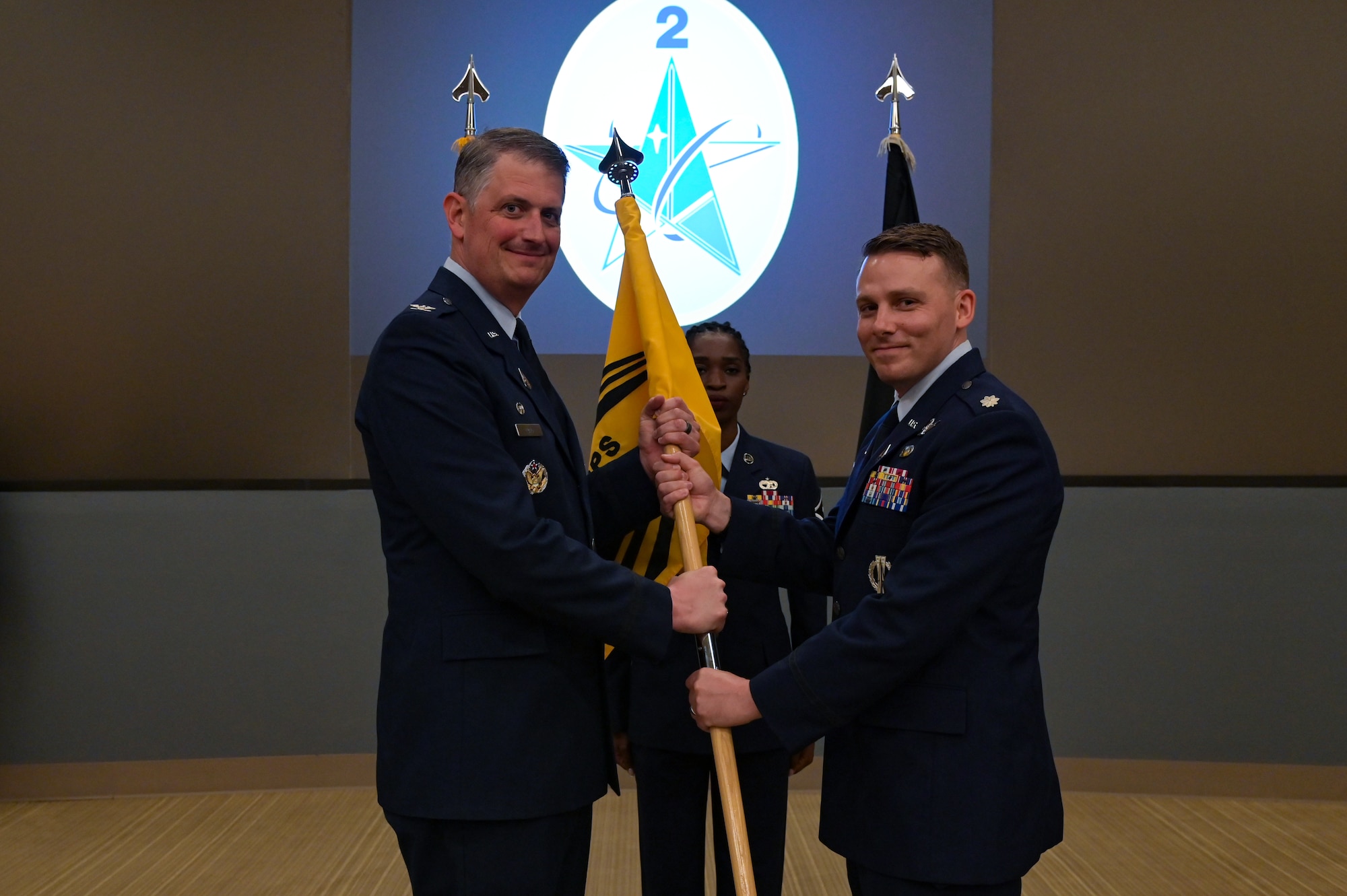 U.S. Space Force Col. Robert Long, Space Launch Delta 30 commander, relinquishes command from U.S. Space Force Lt. Col. Nicholas M. Somerman, outgoing 2nd Range Operations Squadron commander, at the 533rd Training Squadron auditorium on Vandenberg Space Force Base, Calif., June 8, 2023.
The 2nd Range Operations Squadron held a change of command ceremony at the 533rd Training Squadron auditorium to transfer command to U.S. Space Force Lt. Col. Darin J. Lister. (U.S. Space Force photo by Senior Airman Rocio Romo)