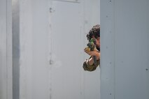 Airman 1st Samantha Rodarte Leon, 841st Missile Security Forces Squadron missile security operator, aims her M16 carbine toward a simulated enemy during Operation Avalanche Defender at Fort William Henry Harrison, Mont., May 31, 2023. Airmen with the 841st MSFS spent upwards of 12 hours each day during the four-day exercise training close-quarters combat, weapon employments, team movements and medical training.