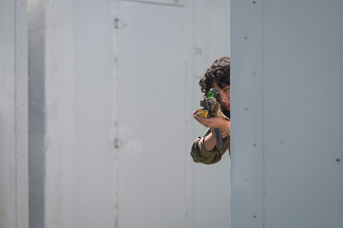 Airman 1st Samantha Rodarte Leon, 841st Missile Security Forces Squadron missile security operator, aims her M16 carbine toward a simulated enemy during Operation Avalanche Defender at Fort William Henry Harrison, Mont., May 31, 2023. Airmen with the 841st MSFS spent upwards of 12 hours each day during the four-day exercise training close-quarters combat, weapon employments, team movements and medical training.