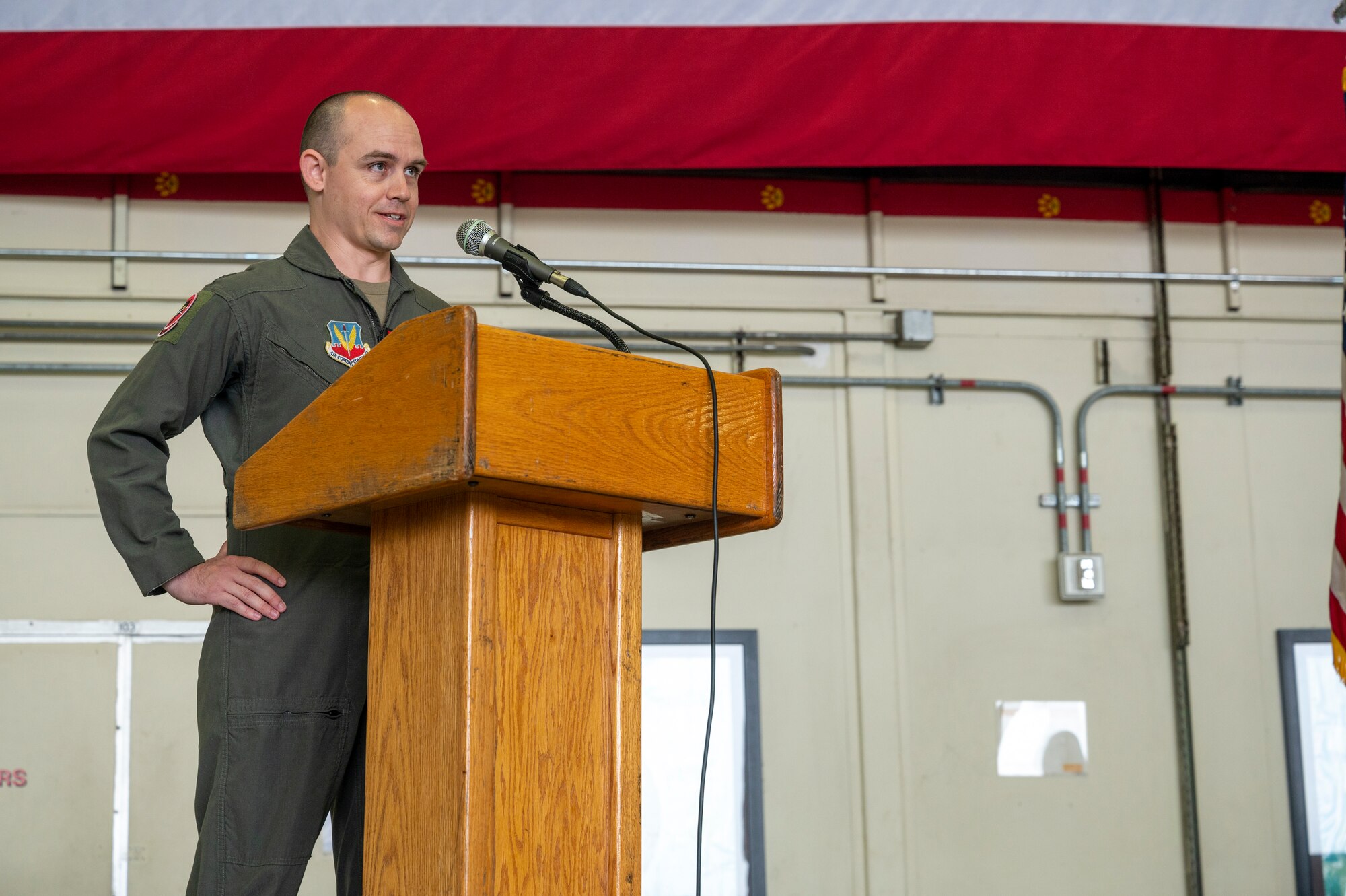 U.S. Air Force Lt. Col. Brandon Olson, 5th Reconnaissance Squadron incoming commander, gives his first speech to his squadron during the 5th RS change of command ceremony at Osan Air Base, Republic of Korea, June 2, 2023. Change of command ceremonies are time-honored traditions deeply-rooted in U.S.military history. (U.S. Air Force photo by Airman 1st Class Aaron Edwards)