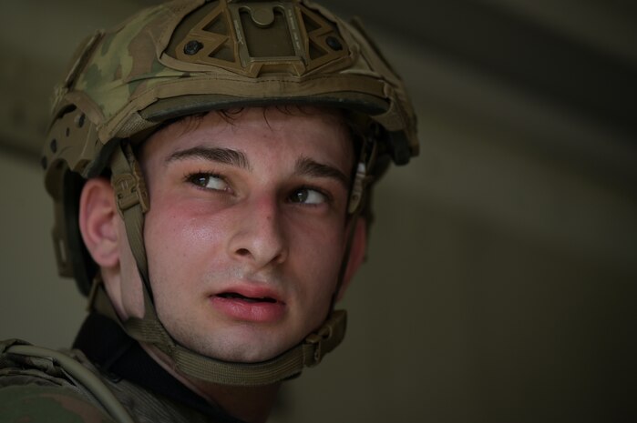 Airman 1st Class Charles Gross, 841st Missile Security Forces Squadron missile security operator, receives instructions from his team leader during a simulated attack on Fort William Henry Harrison, Mont., May 31, 2023. Gross and his team practiced close-quarters combat and team movements during Operation Avalanche Defender, the 841st MSFS’s biggest exercise yet. (U.S. Air Force photo by Staff Sgt. Elora J. McCutcheon)