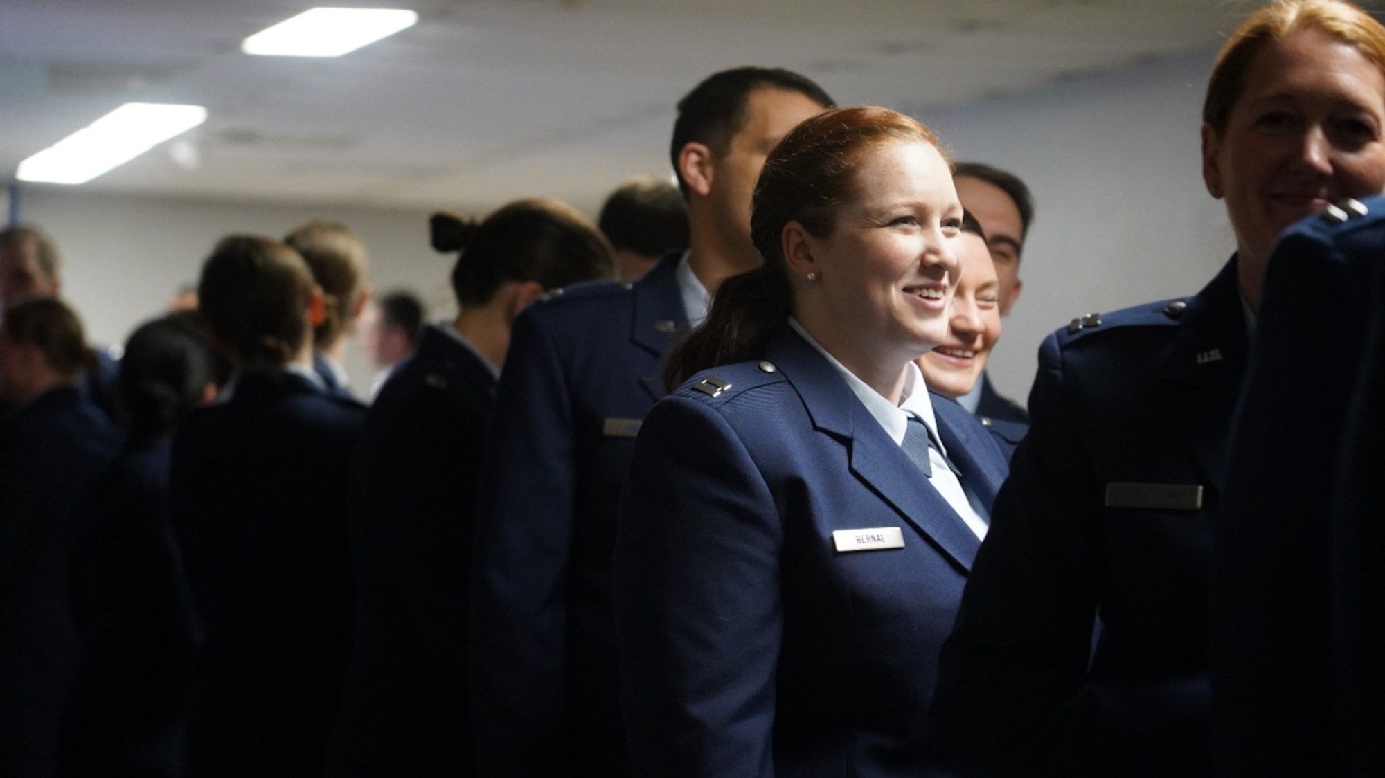 Capt. Catherine Bernal, waits with other residents before the start of Wright-Patterson Medical Center’s residency graduation ceremony.