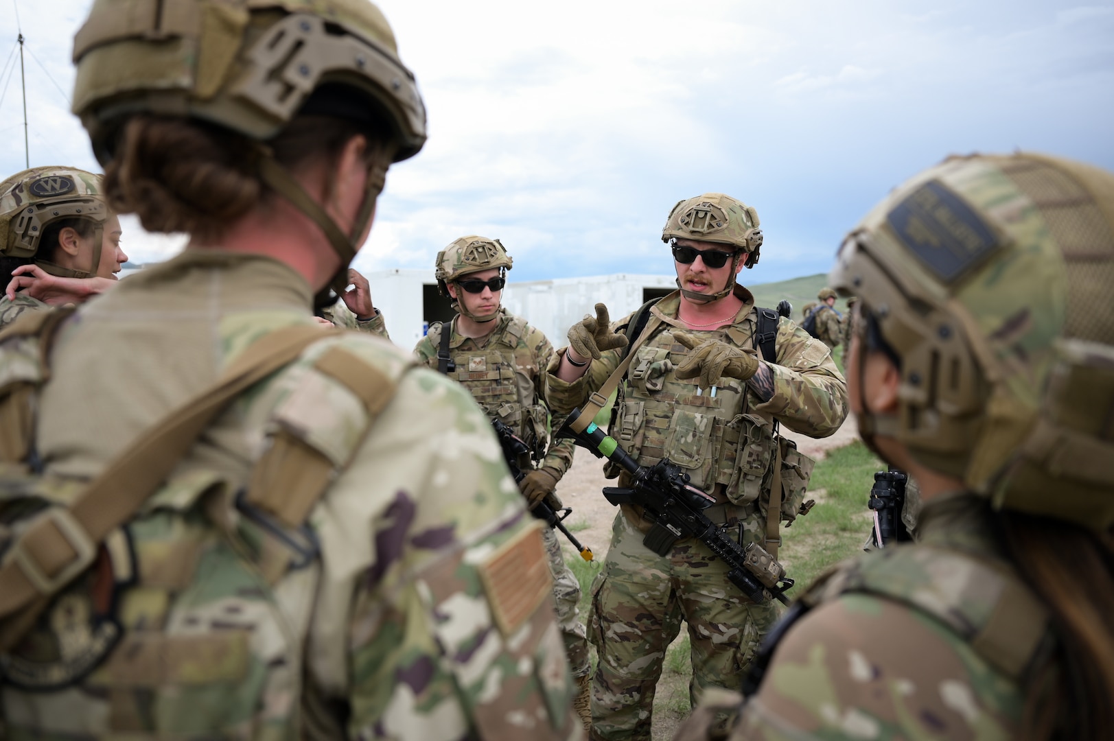 An Airman with the 841st Missile Security Forces Squadron provides a brief prior to a team movement drill at Fort William Henry Harrison, Mont., May 31, 2023. Team movements included in Operation Avalanche Defender, a four-day simulated deployment exercise that also practiced close-quarters combat, weapon employments and medical training.