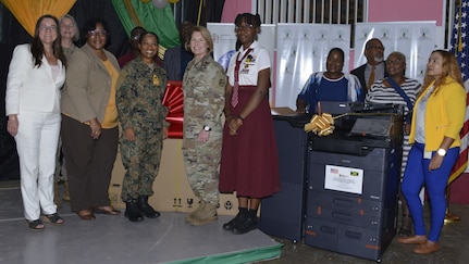 he commander of U.S. Southern Command, U.S. Army Gen. Laura Richardson, poses for a photo along with Jamaican dignitaries and students.