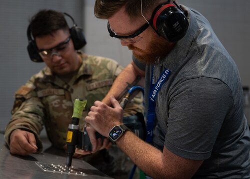 The 349th Maintenance Squadron at Travis AFB, hosted a day- long open house during the June 4th, 2023, unit training assembly to bolster up qualified new recruits interested in aircraft maintenance, welding, and other mechanical career fields. The tour covered many areas of the base, flight line, welding shop areas and a presentation was given to the guests about the Air Force Reserve and what it means to serve. (U.S. Air Force photo by MSgt. Jose Aquilizan)