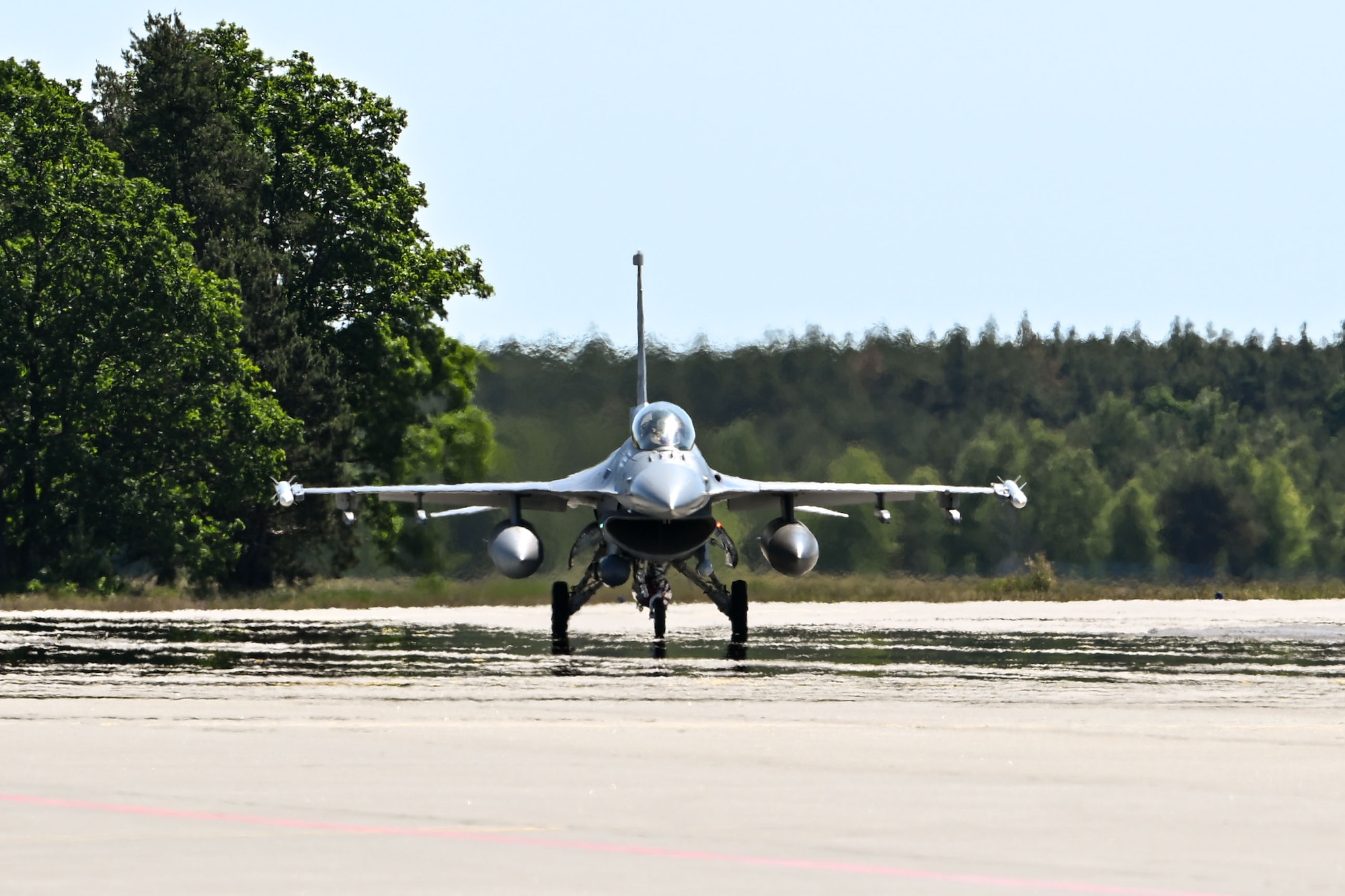 U.S. Air Force Maj. Matthew Alexander , 480th Fighter Squadron F-16 Fighting Falcon pilot, lands at Powidz Air Base, Poland