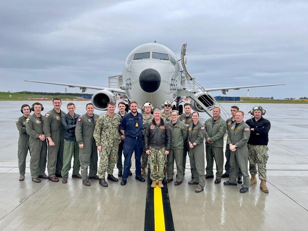 Vice Adm. Thomas Ishee, commander, U.S. Sixth Fleet and commander, Naval Striking and Support Forces NATO (STRIKFORNATO), center, stands with servicemembers supporting exercise Formidable Shield 2023 while observing the exercise, May 20, 2023. Formidable Shield is a biennial exercise involving a series of live-fire events against subsonic, supersonic, and ballistic targets, incorporating multiple Allied ships, aircraft, and ground forces working across battle spaces to deliver effects.