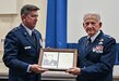 Air National Guard Brig. Gen. Mark A Goodwill, Assistant Adjutant General - Air for the Pennsylvania Air National Guard, presents retired ANG Col. Elwood H. Hippel, Jr. with a plaque commemorating his induction into the Pennsylvania Air National Guard Hall of Fame during a ceremony at the 111th Attack Wing, Horsham, Pennsylvania, June 3, 2023.