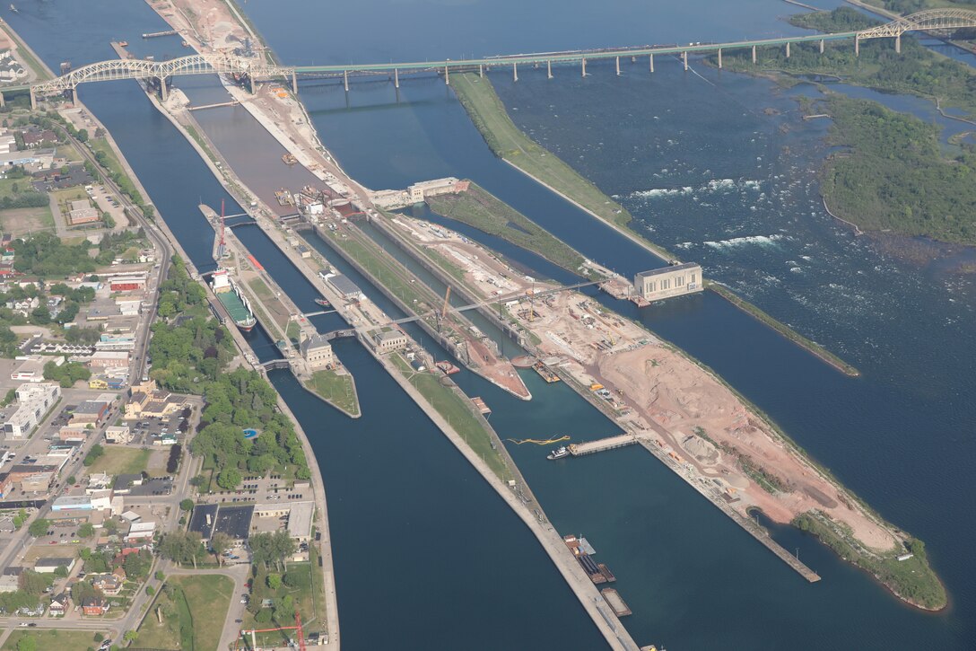 Aerial image of the Soo Locks facility looking west at the New Lock at the Soo construction to the north of the facility.