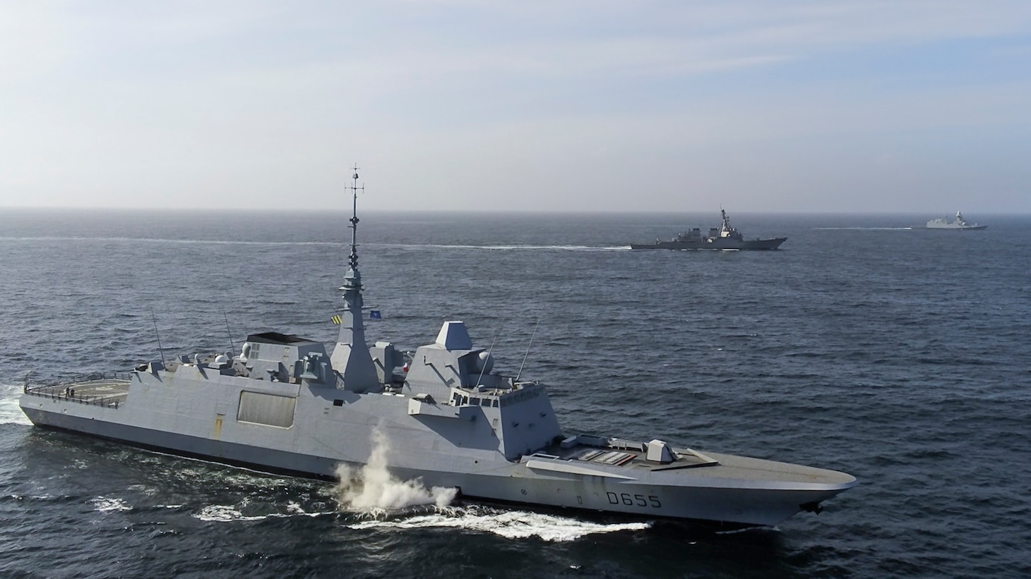 (From left) French Navy FREMM frigate FS Bretagne, U.S. Navy Arleigh Burke-class guided-missile destroyer USS Porter (DDG 78), and Italian Navy Carlo Bergamini-class FREMM frigate ITS Carlo Margottini (D 592) sail together while underway in support of exercise Formidable Shield 2023, May 10, 2023. Formidable Shield is a biennial integrated air and missile defense (IAMD) exercise involving a series of live-fire events against subsonic, supersonic, and ballistic targets, incorporating multiple Allied ships, aircraft, and ground forces working across battlespaces to deliver effects. (Courtesy photo by Marine Nationale/French Navy)