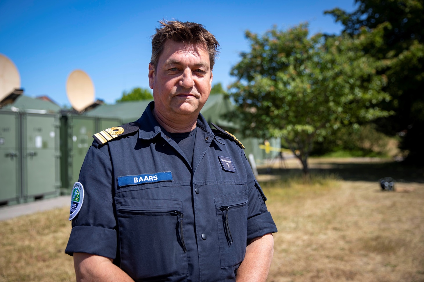 PUTLOS, Germany (June 7, 2023) Royal Netherlands Navy Cmdr. Peter Baars poses for a photograph near the NATO Commander Task Group 162.40 command staff area at the Bundeswehr military training area in Putlos, Germany, during exercise Baltic Operations 2023 (BALTOPS 23). BALTOPS 23 is the premier maritime-focused exercise in the Baltic Region. The exercise, led by U.S. Naval Forces Europe-Africa, and executed by Naval Striking and Support Forces NATO, provides a unique training opportunity to strengthen combined response capabilities critical to preserving freedom of navigation and security in the Baltic Sea. (U.S Navy photo by Mass Communication Specialist 1st Class Matthew Fink)