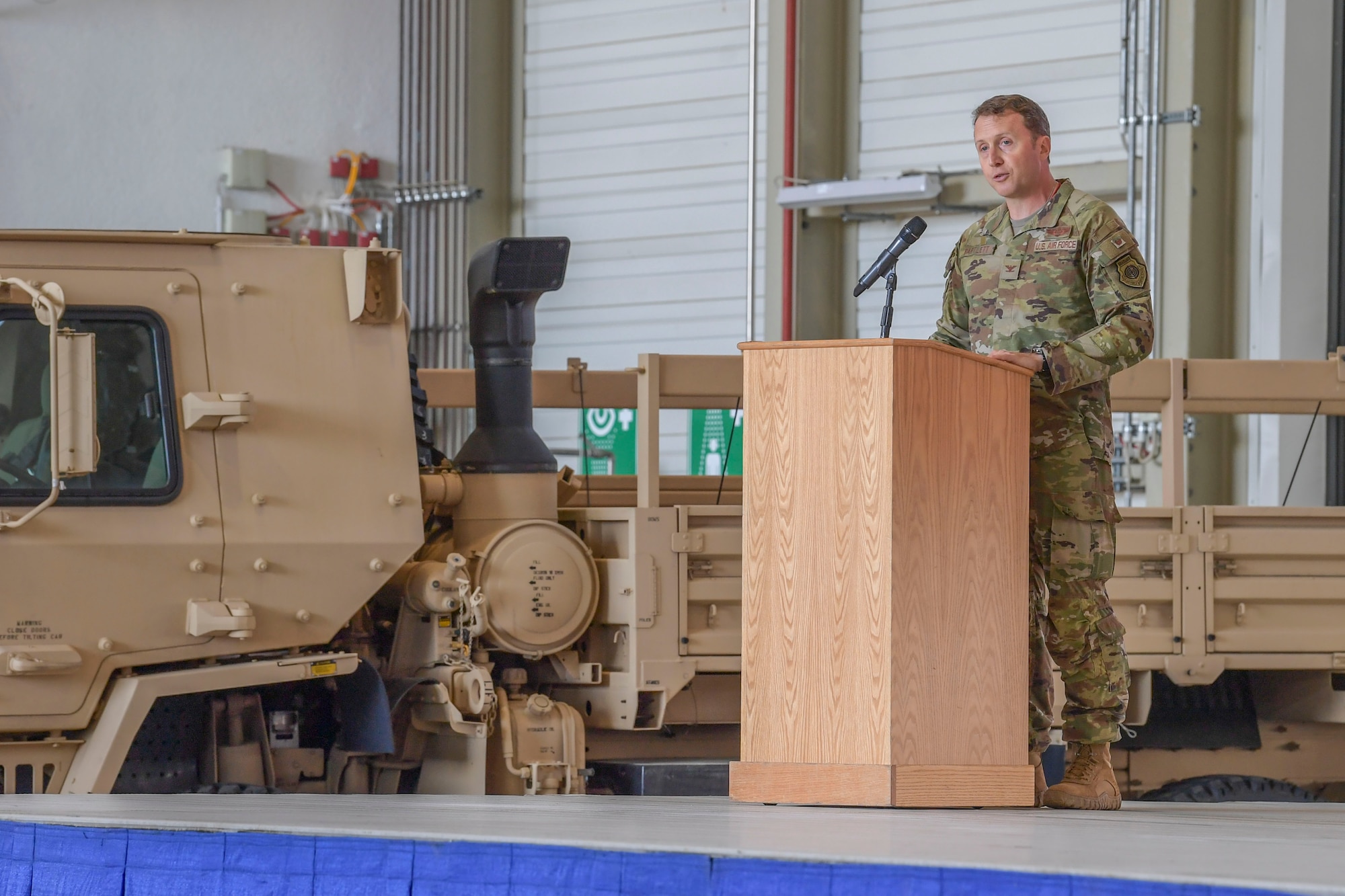U.S. Air Force Col. Matthew Bartlett, 435th Air Ground Operations Wing incoming commander, addresses the wing during the 435th AGOW change of command ceremony at Ramstein Air Base, Germany, June 9, 2023.