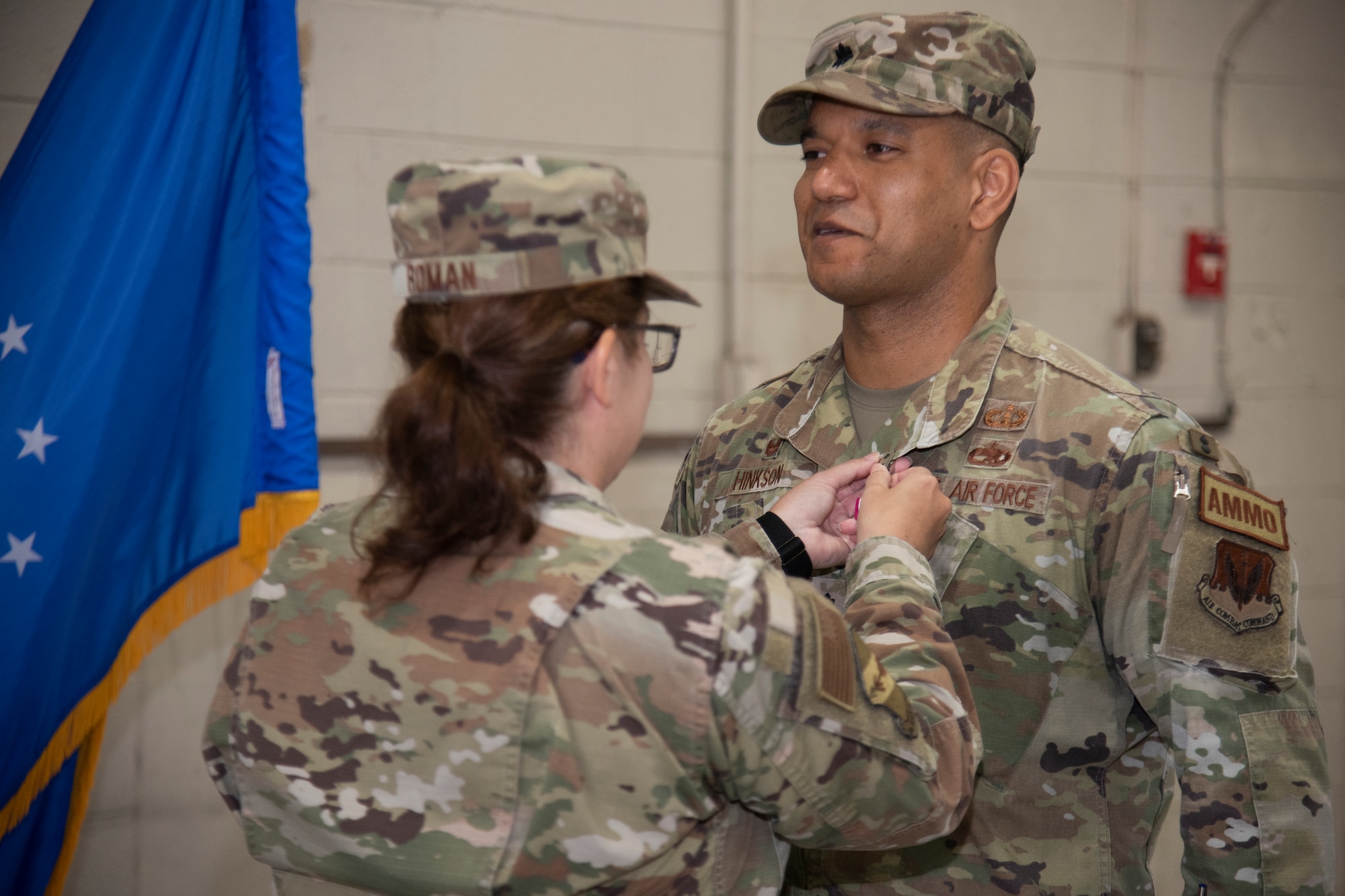 Col. Kathryn Roman, left, 4th Maintenance Group commander, awards the Meritorious Service Medal to Lt. Col. Marvin Hinkson, right, 4th Munitions Squadron outgoing commander, during the 4th MUNS change of command ceremony at Seymour Johnson Air Force Base, North Carolina, June 1, 2023. In keeping with tradition, the ceremony gave Hinkson chance to bid his Airmen farewell, and allowed Maj. James Phillips, 4th MUNS incoming commander, the opportunity to formally assume command of the squadron, meet the Airmen in his unit, and express his aspirations for the squadron’s future. (U.S. Air Force photo by Tech. Sgt. Christopher Hubenthal)