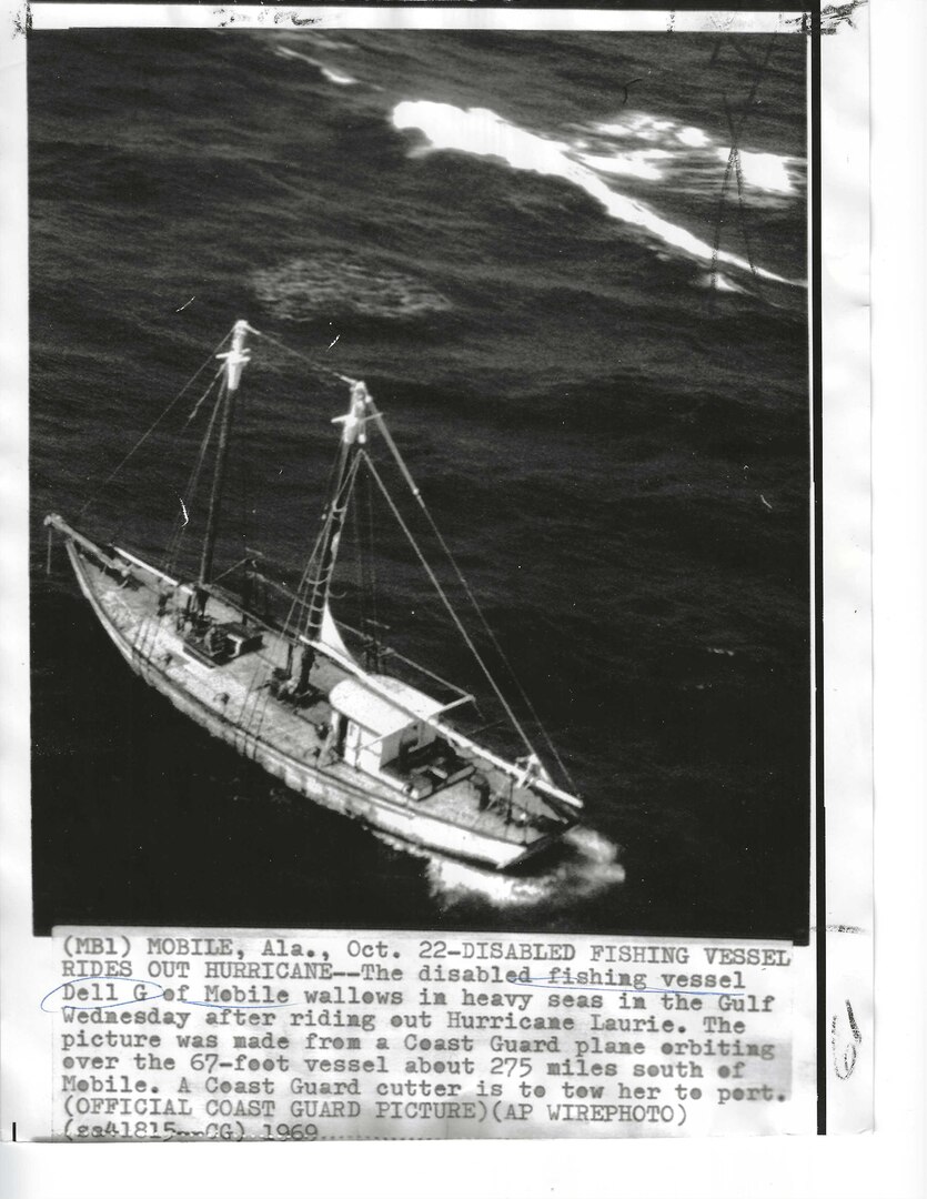 A rare aerial photograph showing the former New England fishing schooner Dell G wallowing in heavy seas. (Courtesy of Foundation for Coast Guard History)