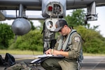 U.S. Air Force Capt. Mike Shufeldt, a pilot assigned to the 190th Fighter Squadron, 124th Fighter Wing, Idaho National Guard, conducts post-flight documentation on Lechfeld Air Base, Germany, in preparation for exercise Air Defender 2023 on June 6, 2023. Exercise AD23 integrates U.S. and allied air-power to defend shared values, while leveraging and strengthening vital partnerships to deter aggression around the world.