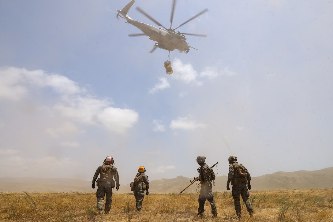 CLB-15 and HMH-361 worked together to test an innovative lift method utilizing wheel nets to inform publication and standard operating procedure development for the Marine Corps. (U.S. Marine Corps photo by Cpl. Aidan Hekker)