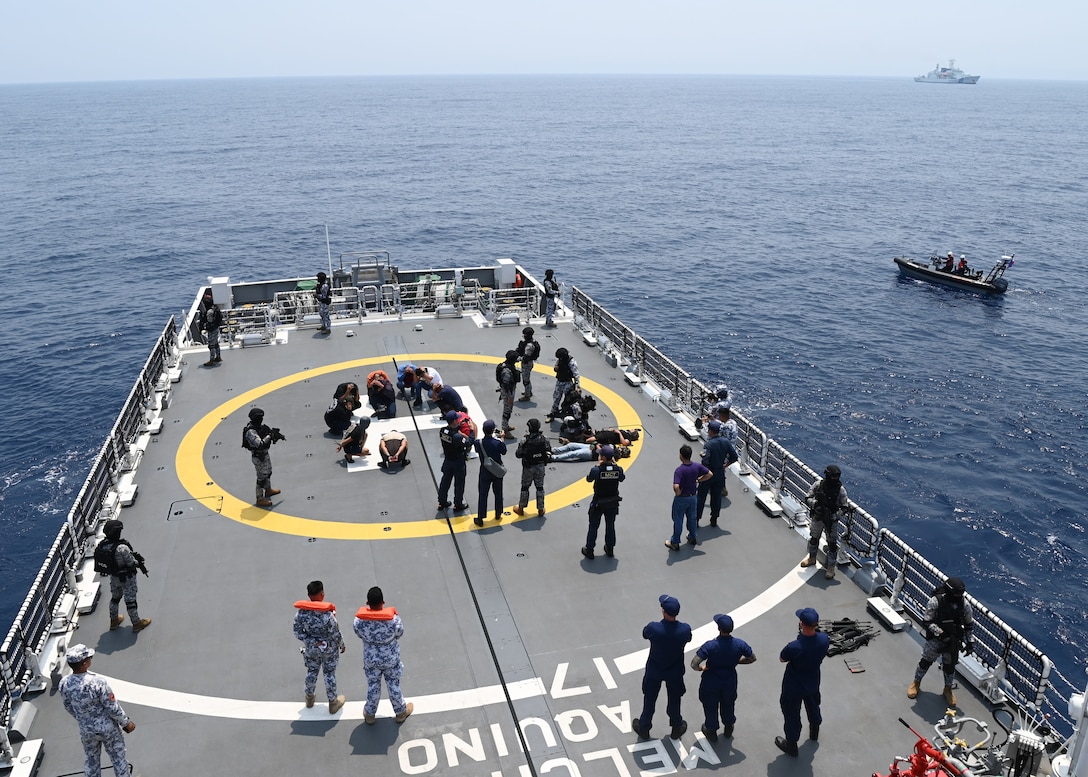 Philippine Coast Guard Special Operations Force teams conduct a simulated law enforcement boarding on the Philippine Coast Guard Vessel BRP Melchora Aquino (MRRV-9702) in the South China Sea as members from the Japan and U.S. Coast Guard observe the exercise, June 6, 2023. U.S. Coast Guard Cutter Stratton’s (WMSL 752) crew are participating in the first trilateral engagements between the sea services while deployed to the Western Pacific to operate with regional allies and partner nations, reinforcing a rules-based order and maritime governance to promote a free and open Indo-Pacific. (U.S. Coast Guard photo by Chief Petty Officer Matt Masaschi)