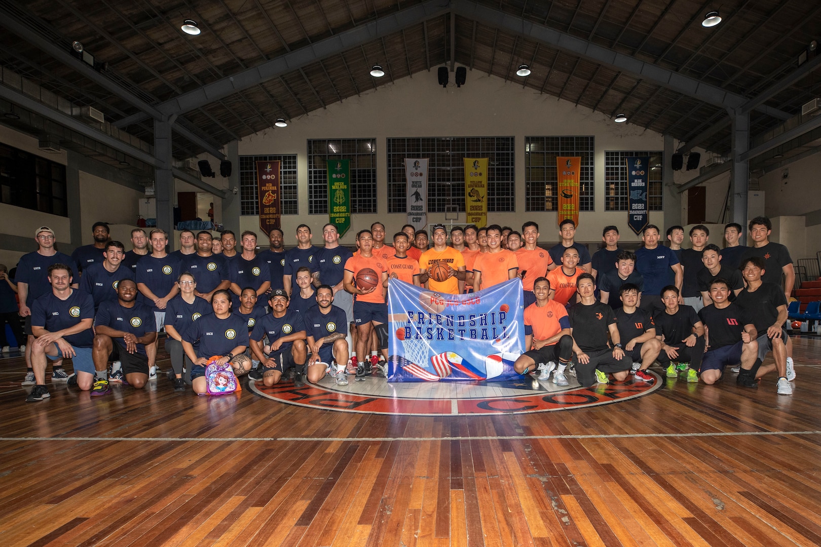 (From left) Sailors from U.S. Coast Guard Cutter Stratton (WMSL 752), the Philippine Coast Guard, and Japan Coast Guard Vessel Akitsushima (PLH 32) take part in a basketball tournament in Manila, Philippines, June 2 before beginning a multi-day trilateral exercise. Stratton deployed to the Western Pacific to conduct engagements with regional allies and partner nations, reinforcing a rules-based order in the maritime domain. (U.S. Navy photo by Chief Petty Officer Brett Cote)