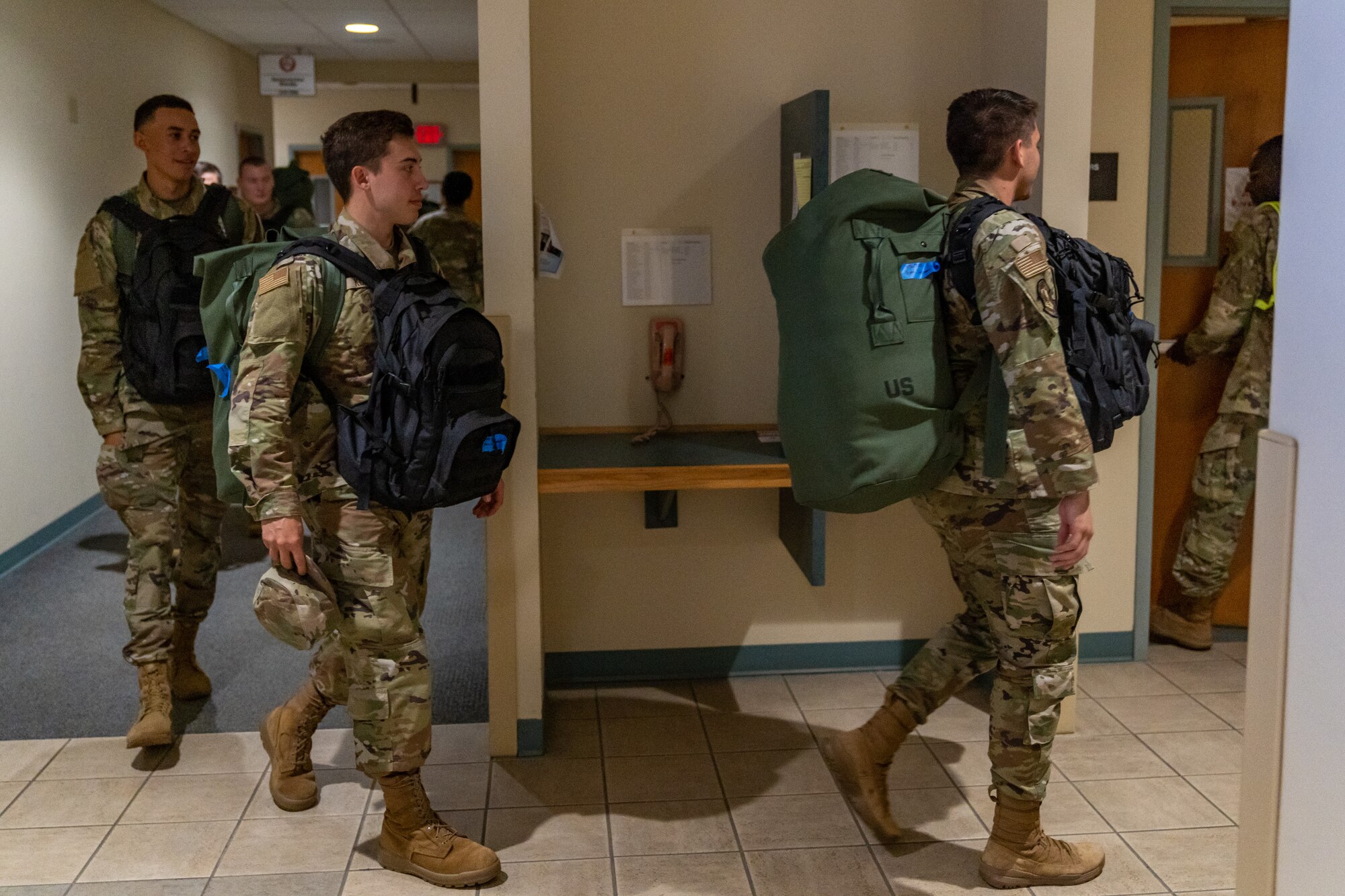 Students with the 336th Training Squadron make their way to the out processing center at the Thompson Hall shelter during a hurricane exercise at Keesler Air Force Base, Mississippi, June 9, 2023.