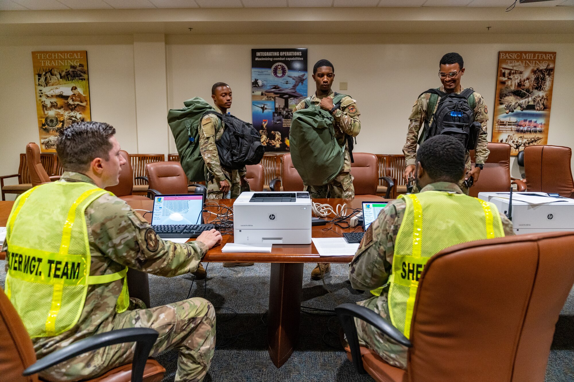 Members of the 336th Training Squadron sheltering team out-process Airmen at the Thompson Hall shelter during a hurricane exercise at Keesler Air Force Base, Mississippi, June 9, 2023.