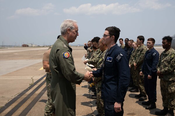 Adm. Meier speaks with Sailors