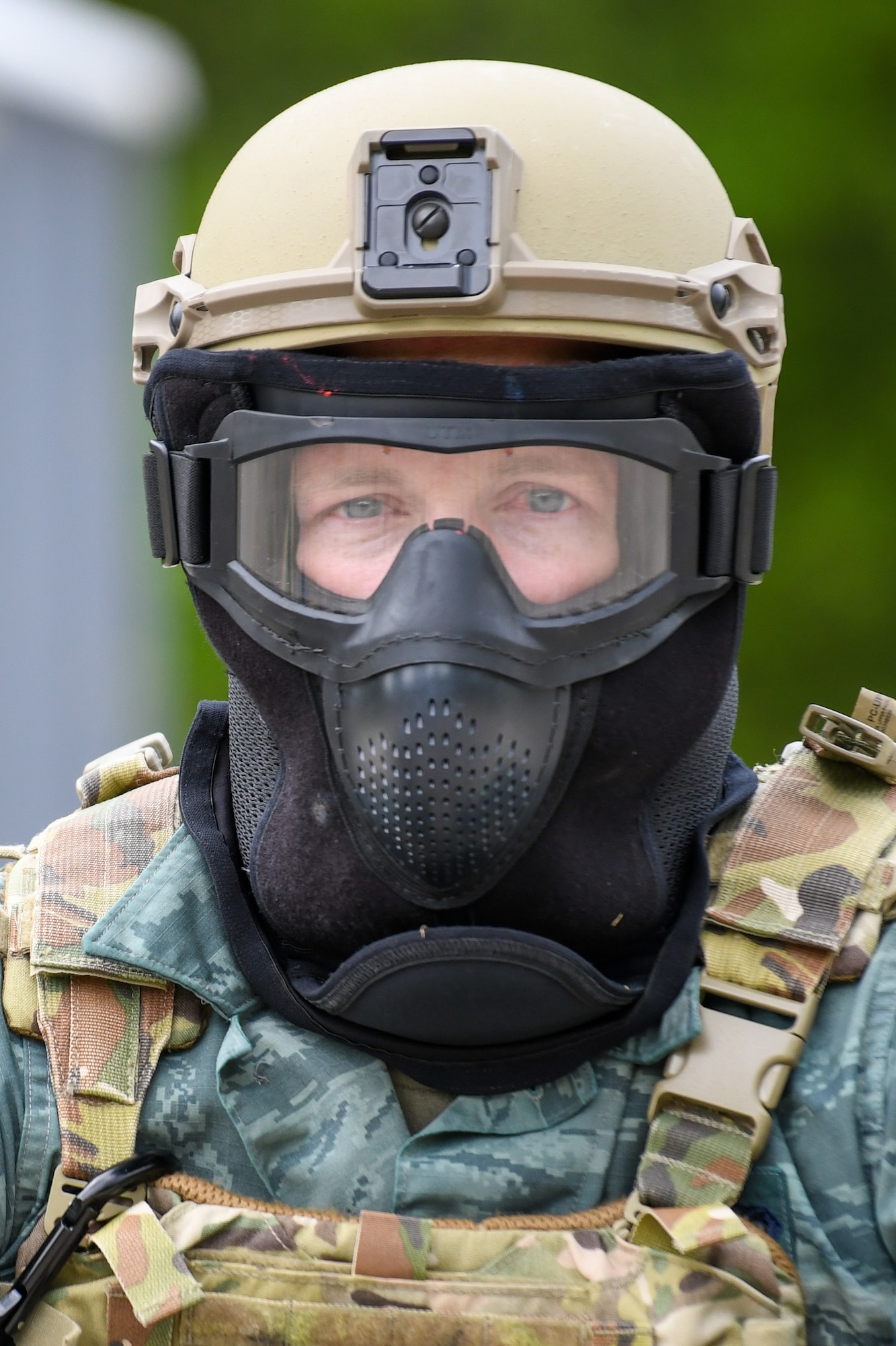 Master Sgt. Keith Carter, a member of the 433rd Security Forces Squadron, Lackland Air Force Base, Texas, awaits the arrival of an attacking force during an area security operations exercise, May 19, 2023, at Camp James A. Garfield Joint Military Training Center, Ohio.
