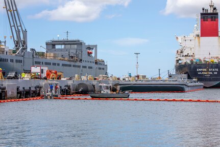 Joint Task Force-Red Hill (JTF-RH) and spill response personnel perform and observe a spill response exercise on Joint Base Pearl Harbor-Hickam, Hawaii, June 8, 2023.