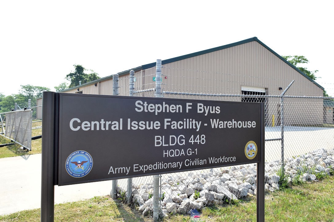 The Army Expeditionary Civilian Workforce alongside Defense Logistics Agency senior leaders and the family of Stephen Byus officially opened the Stephen Byus Central Issue Facility Warehouse June 8 during a memorialization ceremony at Camp Atterbury, Indiana.