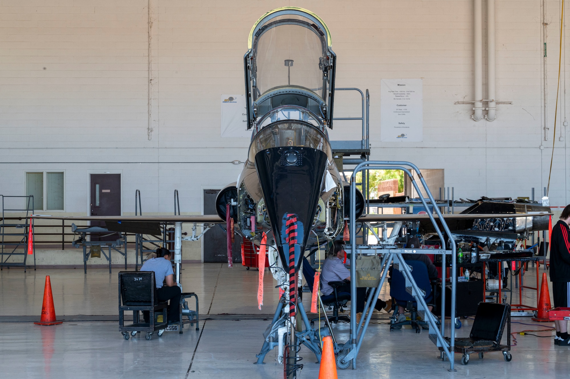 A T-38A/B Talon receives maintenance from T-38 Aircraft Maintenance Program contractors at Holloman Air Force Base, New Mexico, June 8, 2023.